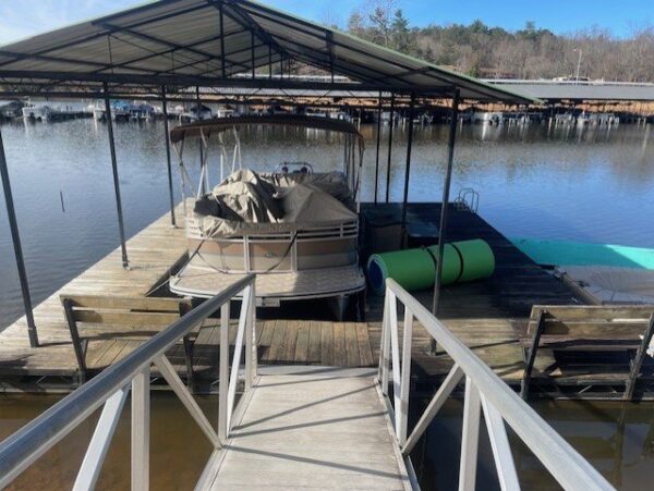 A sturdy and stylish steel dock featuring a gable roof design