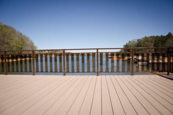 Close-up of a dock floor, textured with weathered wood planks.