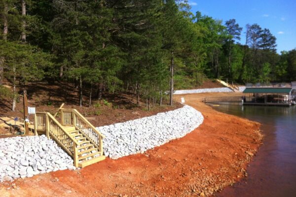 A set of rock steps leading upwards in a natural outdoor setting.