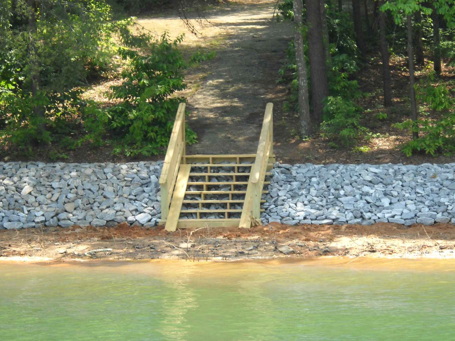 An image shows Shoreline and Pathway Steps Installation Lake Lanier