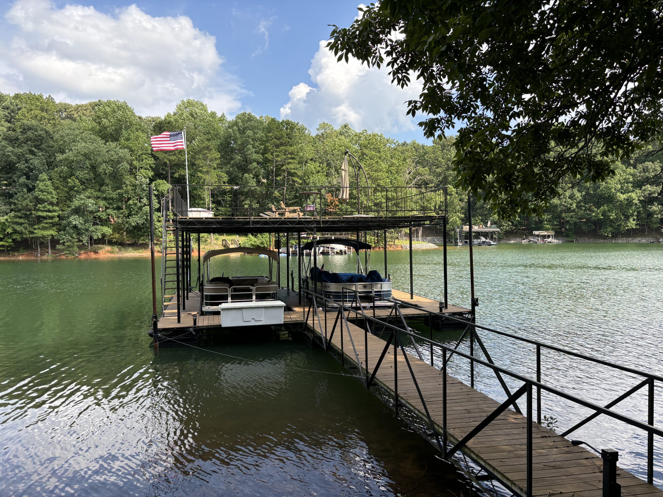 A dual slip boat dock with sundeck.