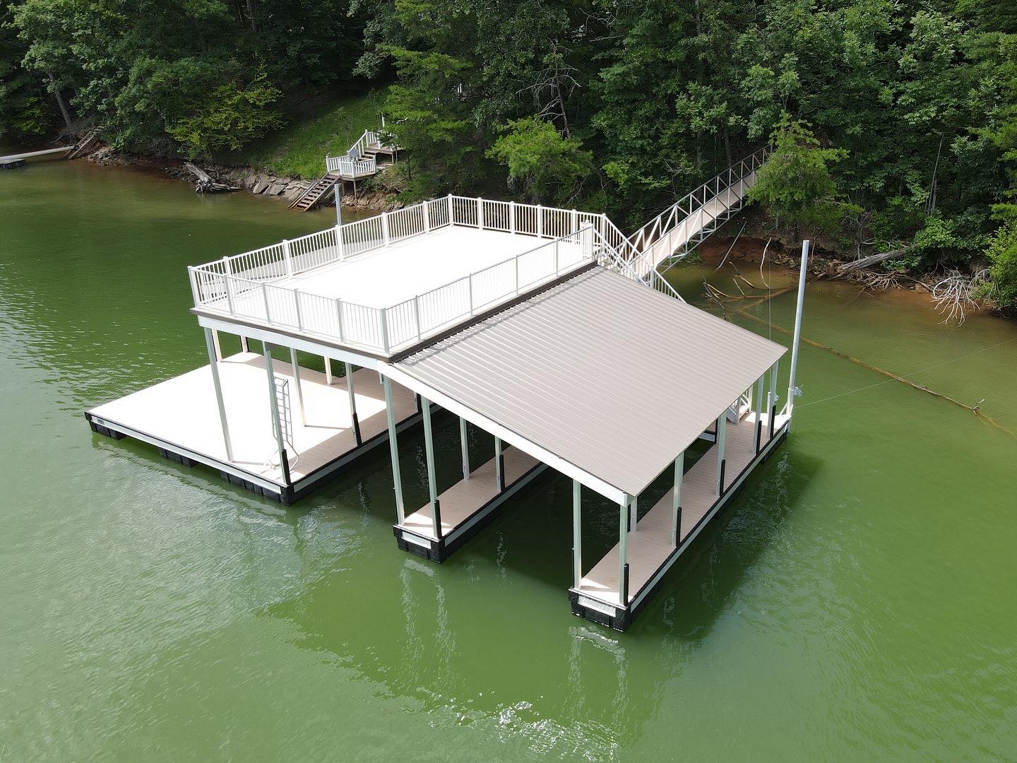 Modern two-story dock with railed upper sundeck on Lake Lanier