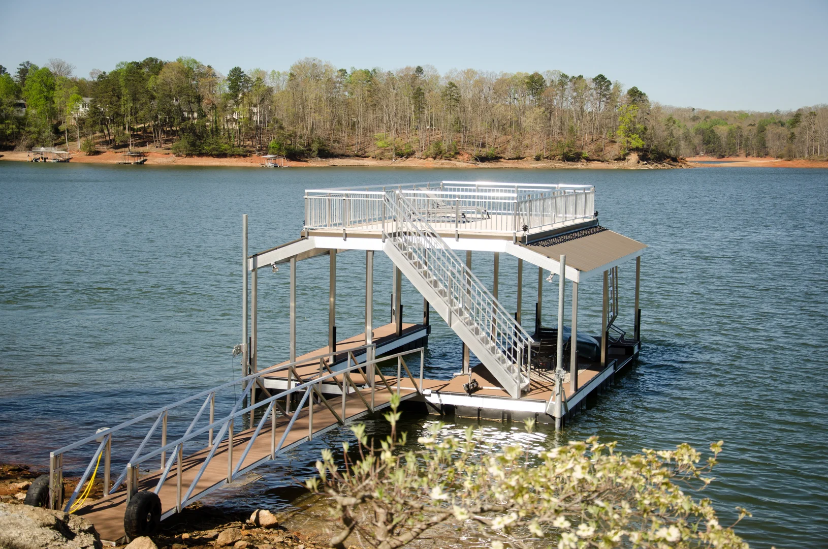 aluminum floating dock on a clear lake