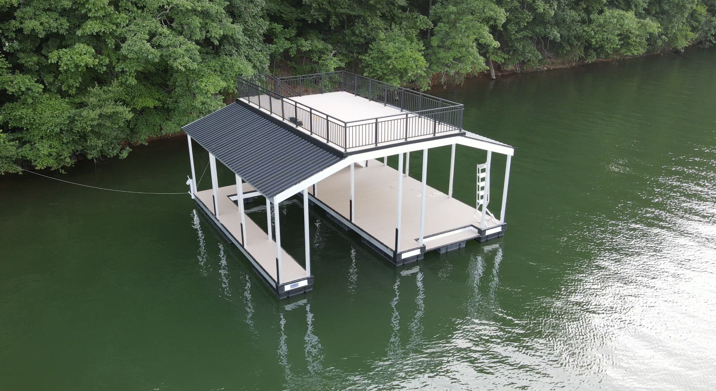Custom double-decker boat dock with sundeck on Lake Lanier built by Martin Docks
