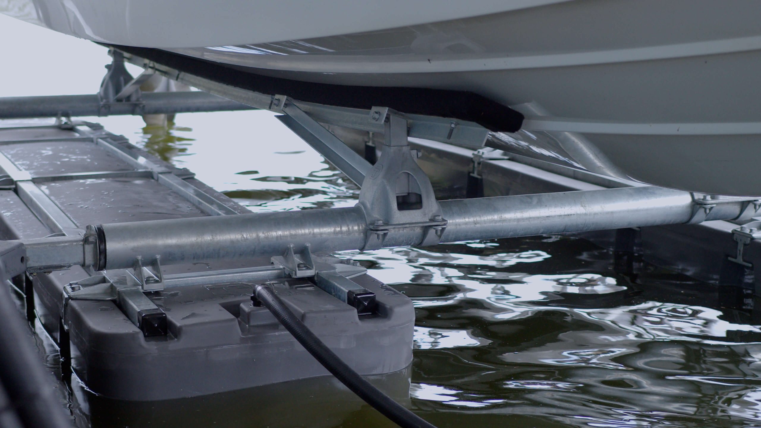 DuraTek Shallow Water Series lift with wake boat raised