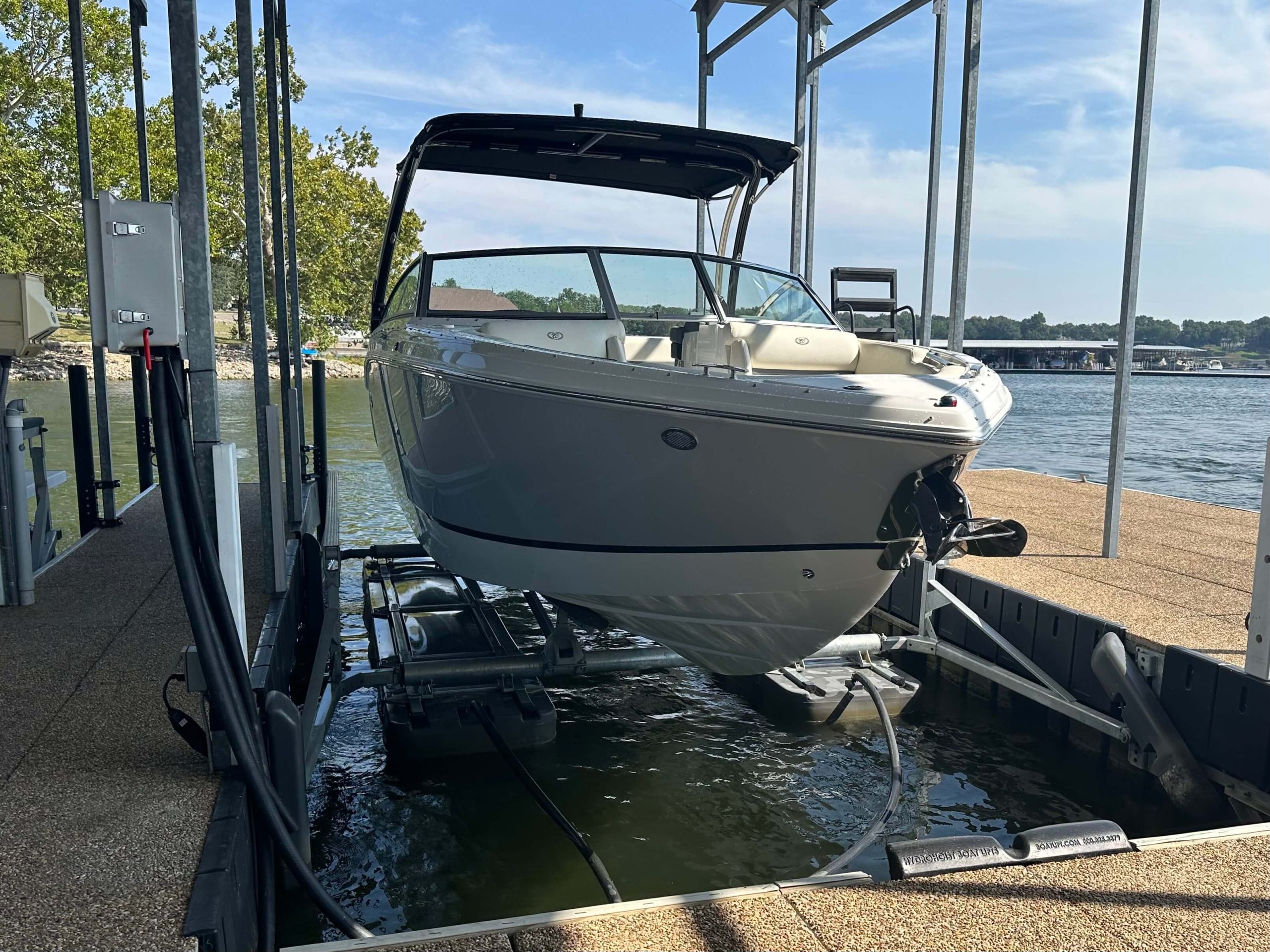 DuraTek Shallow Water Series lift under a low dock roof